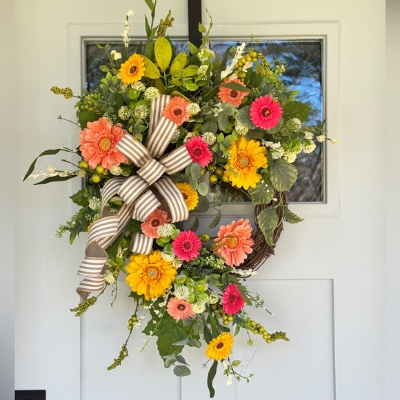 Vibrant Floral Wreath with Striped Bow